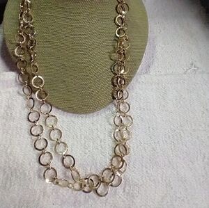 Goldtone circles long necklace